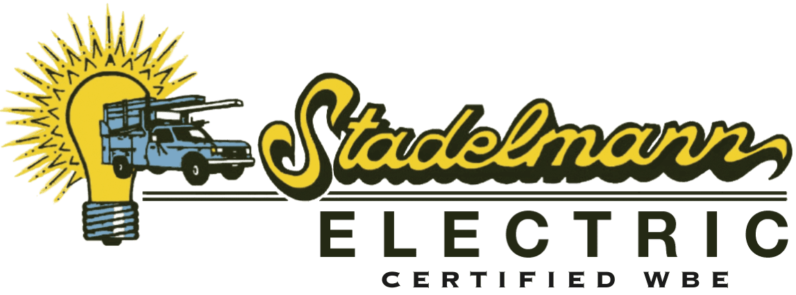 Certified WBE Logo of Stadelmann featuring a light bulb with a truck inside and the name "Stadelmann" written in cursive to the right of the image.